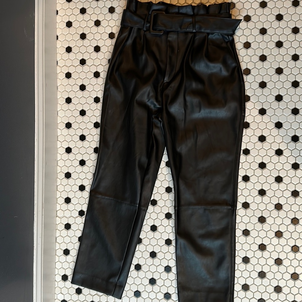High wasted ankle length leather pants. (Vegan)